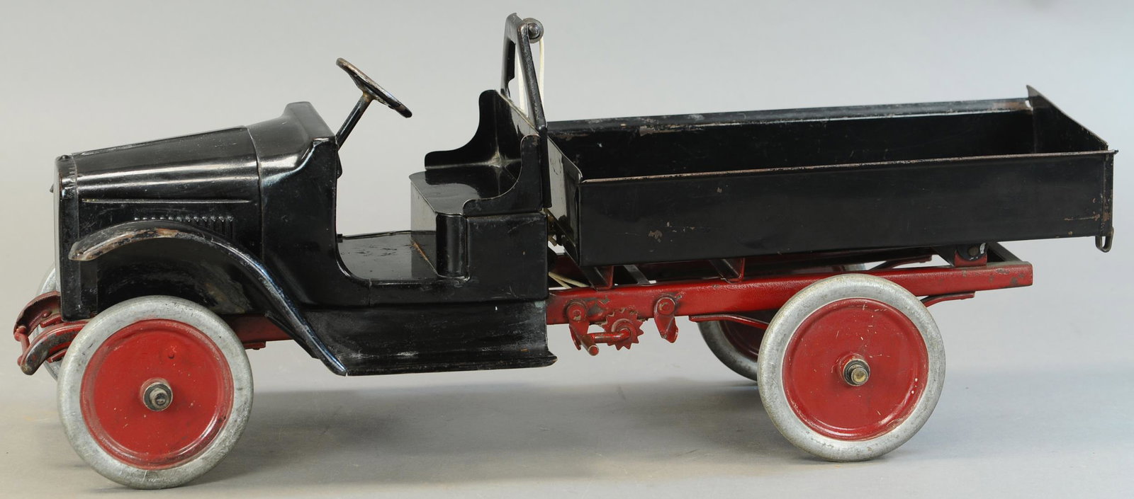 BUDDY L A-FRAME ROPE DUMP TRUCK: 116. BUDDY L A-FRAME ROPE DUMP TRUCK | 24" l. | Repair at rivets on frame, some lacquer throughout truck. | $250 - $500