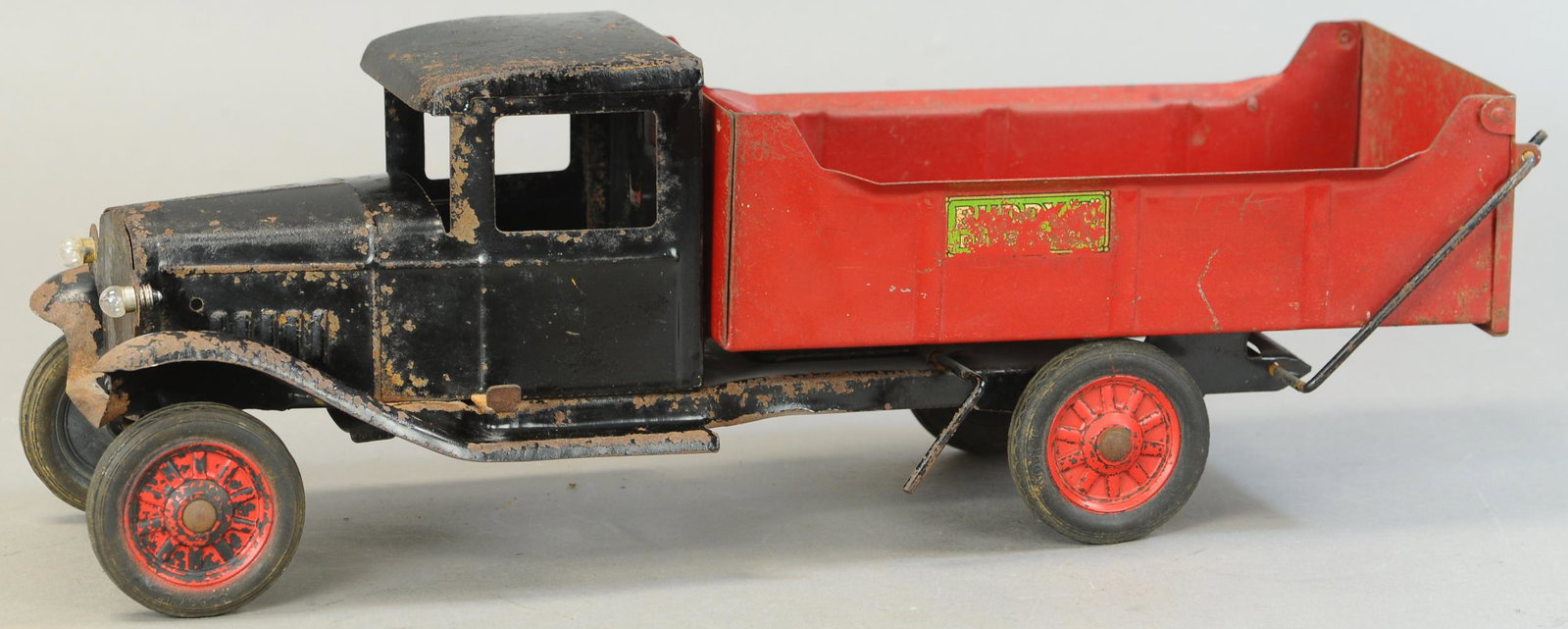 BUDDY L MANUAL DUMP TRUCK: 146. BUDDY L MANUAL DUMP TRUCK | 20" l. | Areas of oxidation, otherwise in All Original Condition. | $200 - $400