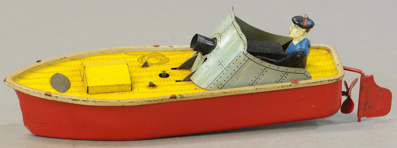 VICTOR BONNET GUN BOAT: 276. VICTOR BONNET GUN BOAT | 8" l. | Flint to cause spark from gun is present, but worn down, otherwise in All Original Condition. | $200 - $400