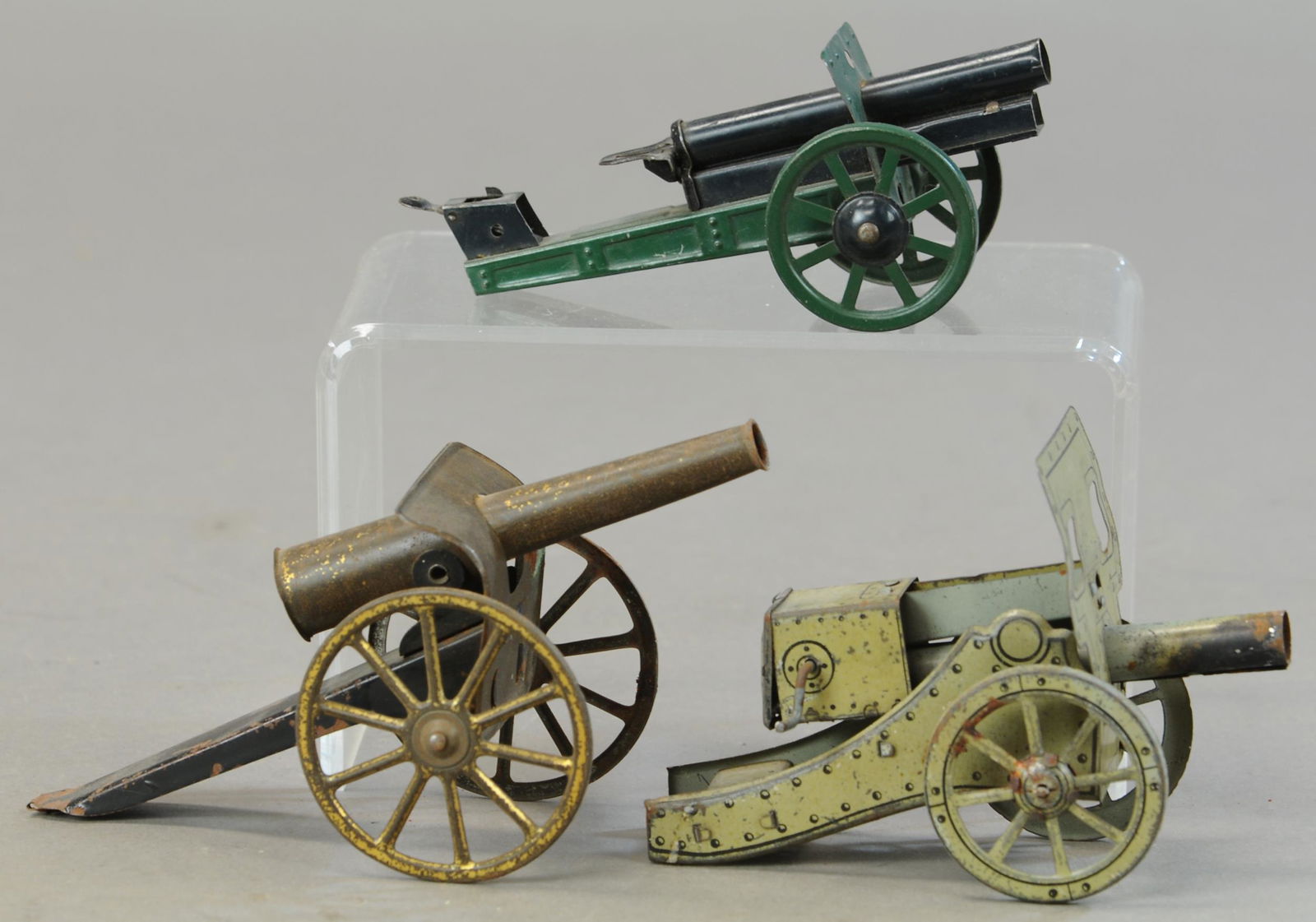 THREE TIN FLOOR CANNON TOYS (1 of 3)