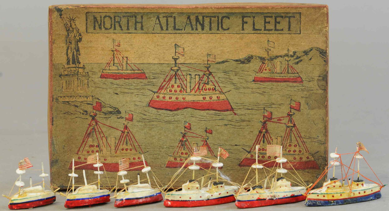 BOXED NORTH ATLANTIC FLEET WOODED SHIPS: 330. BOXED NORTH ATLANTIC FLEET WOODED SHIPS | 2" - 3" h. | All Original Condition. | $200 - $600
