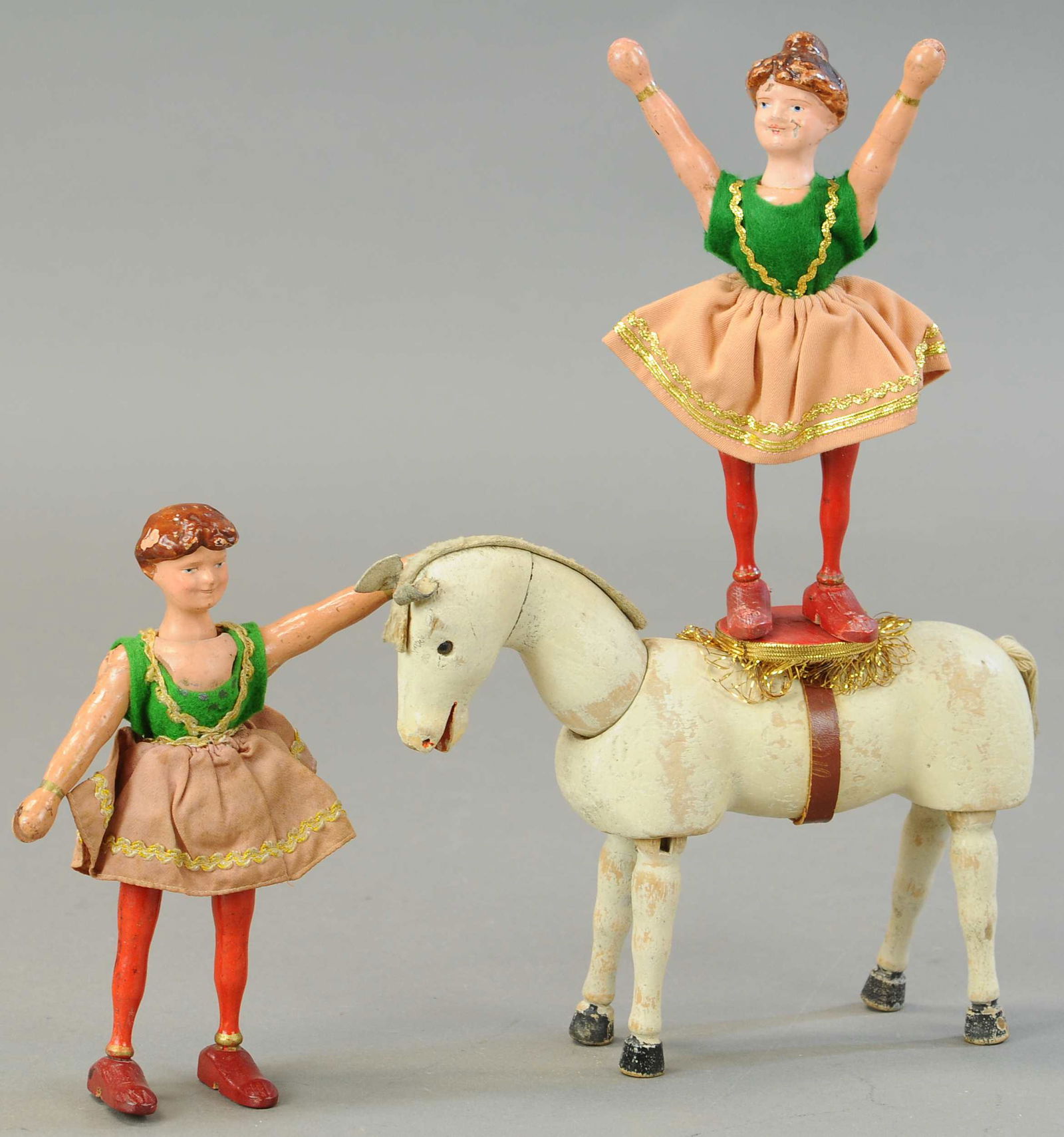TWO WOMAN ACROBATS AND PERFORMING HORSE (1 of 3)