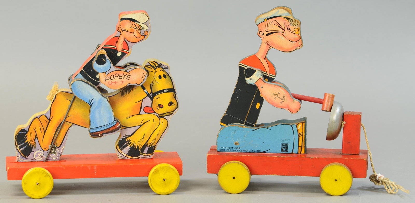 FISHER PRICE POPEYE COWBOY & POPEYE BELL RINGER: 552. FISHER PRICE POPEYE COWBOY & POPEYE BELL RINGER | 10" l. | All Original Condition. | $200 - $400