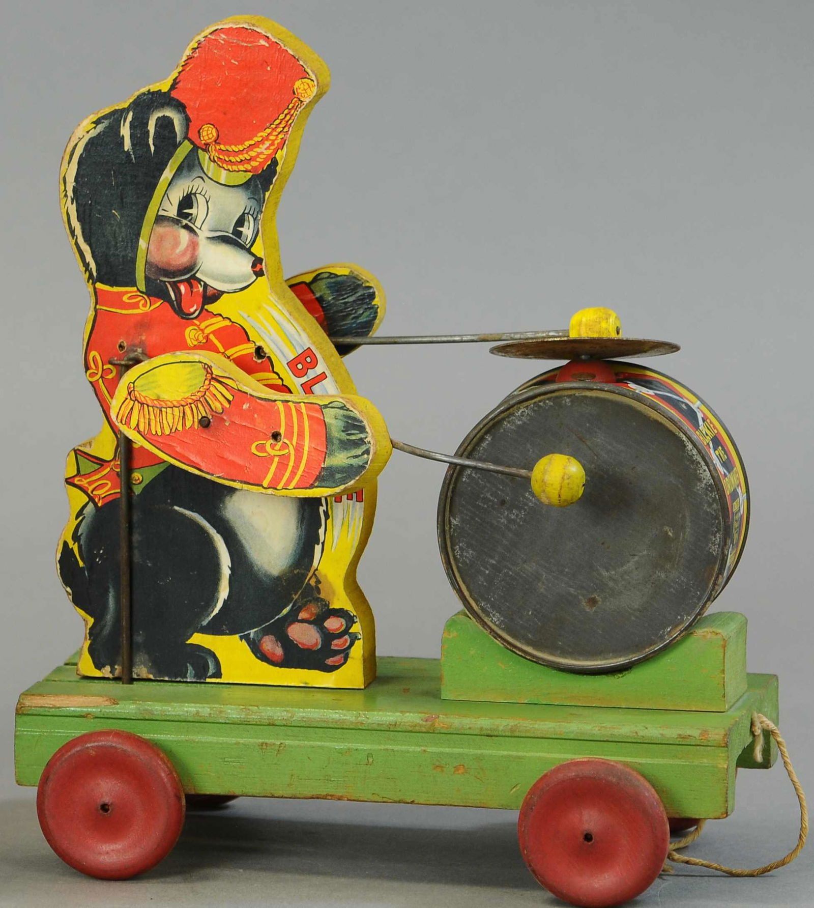 FISHER PRICE BLACKIE DRUMMER: 556. FISHER PRICE BLACKIE DRUMMER | 11" h. | All Original Condition. | $200 - $400