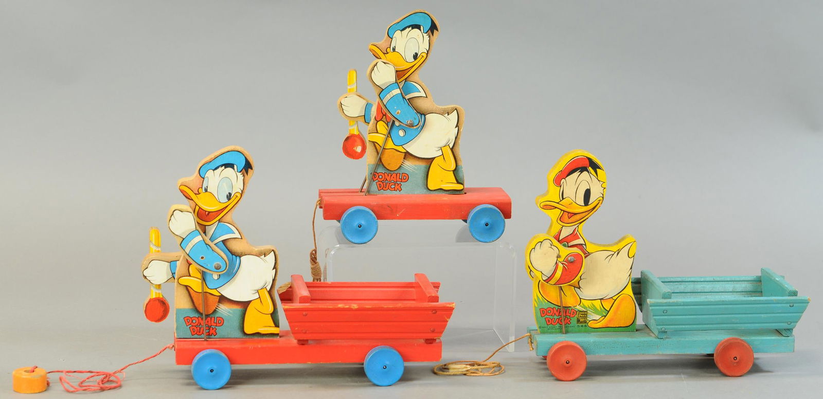 THREE FISHER PRICE DONALD DUCK PULL TOYS (1 of 4)