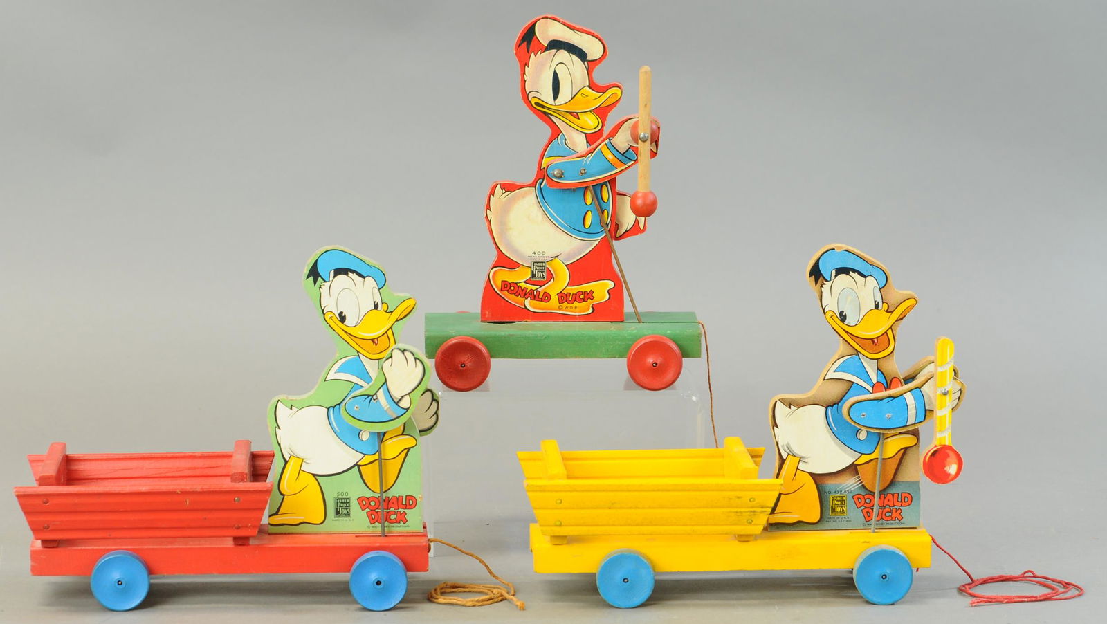 THREE FISHER PRICE DONALD DUCK PULL TOYS (1 of 4)
