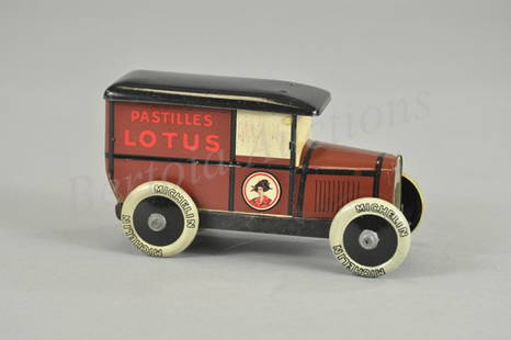 DeANDREIS "PASTILLES LOTUS" PEUGEOT DELIVERY TRUC: France, c. 1938, lithographed tin, graphic image of woman logo on side, roof lifts for retrieval, disc wheels. 6 1/2" l.