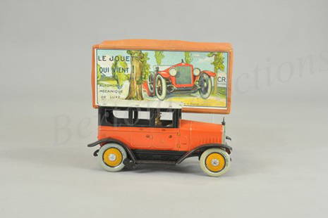 CHARLES ROSSIGNOL FOUR DOOR SEDAN WITH ORIGINAL B: France, c. 1925, lithographed tin, bright orange body, black sides, grey roof, seated driver, hood ornament, clockwork driven, billed as "LeJouet Qui Vient." 9" l.