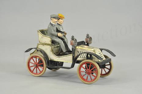 CARETTE OPEN TWO SEAT TOURER: Germany, early 1906 Tonneau, lithographed tin, imagery conjures a day when roads were still mostly gravel, beautiful example and a luxury model with rubber tires and spoke wheels, driven by clockwork