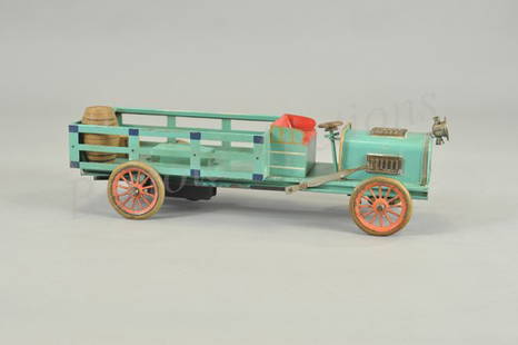 BING OPEN BED DELIVERY TRUCK: Germany, c.1904, hand painted in teal-blue with dark blue highlights and red open bench seat, features solo headlamp, rubber tires, pinkish spoke wheels, clockwork driven, interesting to note body