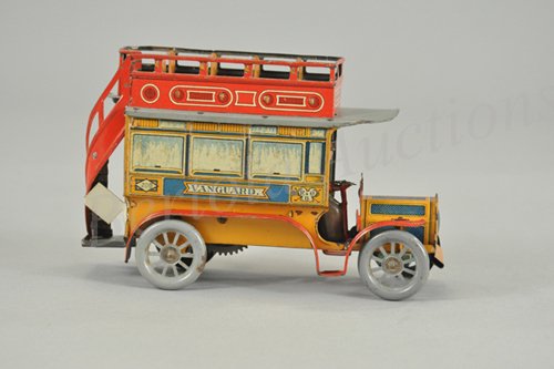 RICHTER & CO. DOUBLE DECKER BUS: Germany, c. 1910, a beautifully lithographed tin bus, reads "Vanguard" on side, very scarce example with upper deck seating, rear stairwell, seated driver and clockwork mechanism. 8" l.