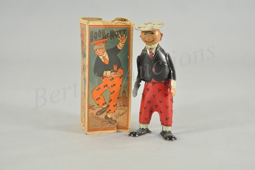 STRAUSS FLAT HAT BOOB MCNUTT IN ORIGINAL BOX: Lithographed tin wind-up toy, working. Flat hat variation is much harder to find. Box art pictures a giant Boob holding the Flat hat toy in his hand. Copyright dated 1924 Star Co. & Rube Goldberg. 8 1