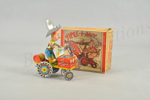 UNIQUE ART RODEO JOE "YIPEE-I-AAAY" IN ORIGINAL B: Litho tin wind-up toy, working. circa 1940s. It takes a few minutes to realize that this is a rodeo cowboy but instead of a bucking bronco to throw him, he has to contend with a whirling, twirling buc