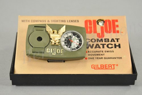 G.I. JOE COMBAT WATCH IN ORIGINAL PACKAGE: 1966, Gilbert, plastic case with eagle at center, features wrist watch and compass with sighting lenses.