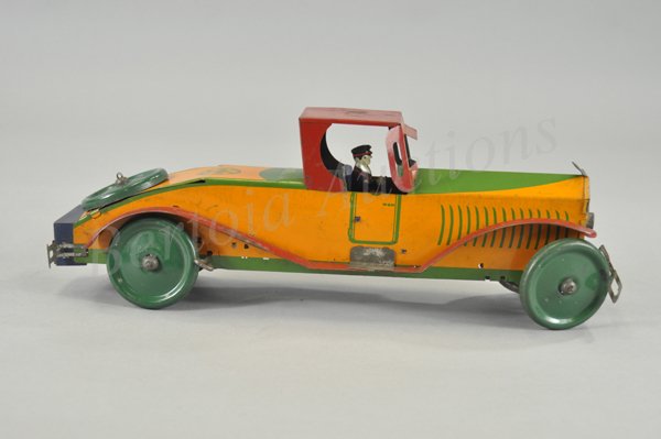 MARX STUTZ COUPE: Lithographed tin, done in blue body, yellow striping, brown roof, black fenders, key wind barrel spring, seated driver, reads "Stutz" on grille and running boards. 16" l.