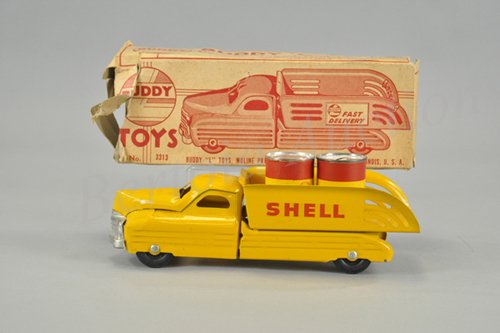 BUDDY 'L' SHELL OIL DELIVERY TRUCK: c. 1950's, boxed example, pressed steel done in yellow overall, "Shell," decal on open body, plated grille, rubber tires, comes with two Shell oil can penny banks. 13" l.