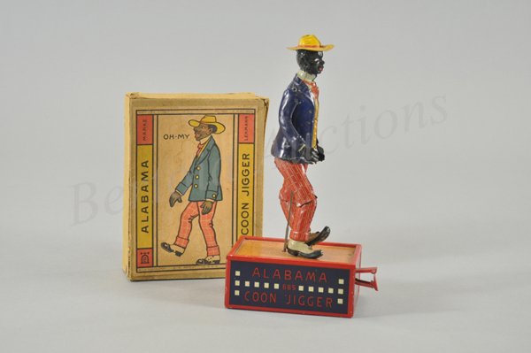 LEHMANN ALABAMA COON JIGGER IN ORIGINAL BOX: Litho tin wind-up toy, working. Circa 1912. From the premier tin toy company in Germany. 10" h.