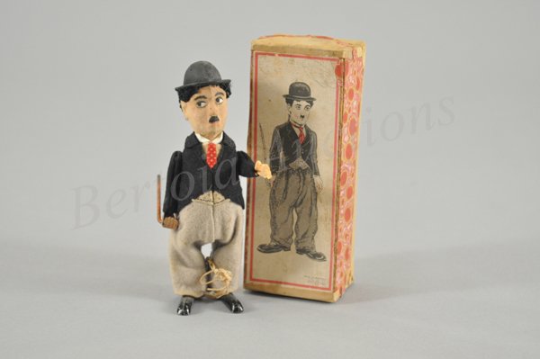 SCHUCO CHARLIE CHAPLIN IN ORIGINAL BOX: Mixed materials wind-up toy, made in Germany c. 1920. 6 1/2" h.