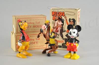 MICKEY MOUSE WHIRLING TAIL, GOOFY WHIRLING TAIL A: All plastic wind up toys, working. Louis Marx made all three in the 1950's. Copyright Walt Disney Productions. Mickey is 6 1/4" h and has a wire tail. Goofy is 7 1/2" and has chipmunk biting his butt