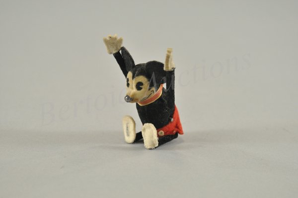 SCHUCO TUMBLING MICKEY MOUSE: Cloth dressed, felt figure wind up toy, working. Made in Germany c. 1934. 4 1/2" h.
