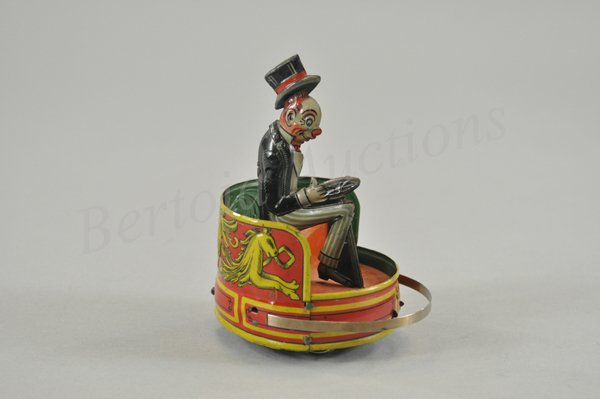 JIGGS BUMPER CAR: Litho tin wind up toy, working. A toy with great eye appeal, beautiful design, gorgeous colors and very hard to find especially in the top condition of this example. Made in Germany c. 1926 possibly b
