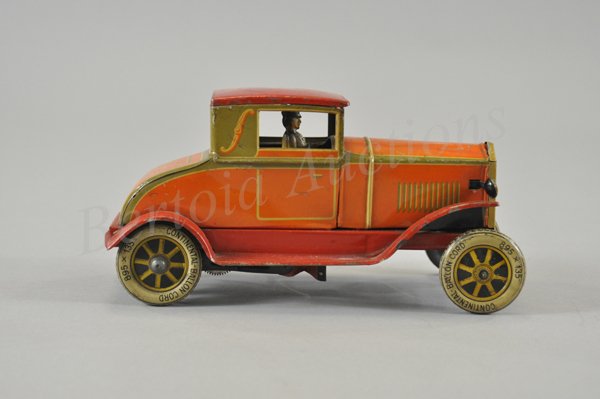 DISTLER COUPE: Germany, c. 1920's, bright orange tin lithography, classic era styling, red fenders and roof, dummy lights, litho spoke graphics, clockwork driven, seated driver, strong action with squeak box on base