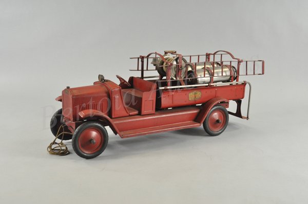 GENDRON "SAMPSON" CHEMICAL FIRE TRUCK: c. 1928, pressed steel, painted in red overall, very well detailed example features two nickel-plated chemical tanks and hose reel, red disc wheels with rubber tires, spot light on hood, decals on sid