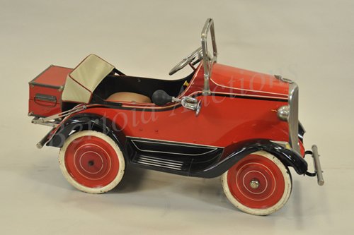 STEELCRAFT CHRYSLER PEDAL CAR: c. 1930's, older restoration to an original body and parts, painted in red with black fenders, all accessories including electric lights, spot light on running board, nickeled bumper and luggage rack,