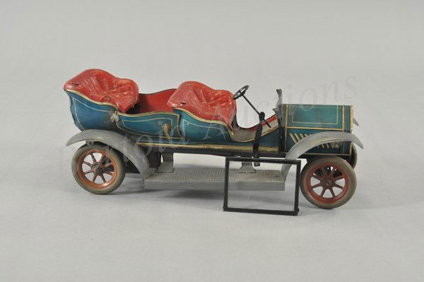 FOUR SEAT TOURER: Germany, lithographed tin, attributed to Hans Eberl, in blue body, red embossed seating, doors once opened (poor repair does not allow opening), spoke wheels, a good sized luxury auto, nice styling ov