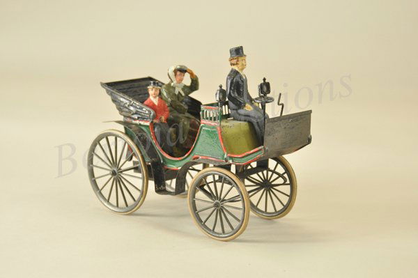 BING HORSELESS CARRIAGE: Germany, c. 1900, very rare example, hand painted open touring auto features clockwork mechanism with activating axle for turning, three people aboard, probably the earlier of any Bing autos produced,