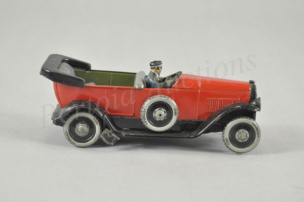 CARDINI TORPEDO: Italy, c. 1922, lithographed tin body done in red, features black soft-cover down, interior embossed, seating done in grey, seated driver, clockwork driven, blue tool box mounted on running boards. 8