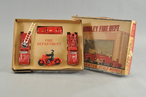 HUBLEY No. 30 BOXED FIRE DEPT. SET: Die cast and plastic, complete toy set features cop on motorcycle, ladder truck, Fire Chief car and fire pumper, great graphics on box lid. Box - 11" x 14".