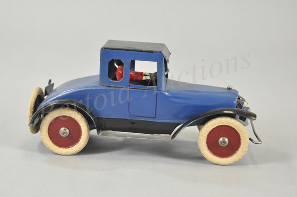 KINGSBURY AUTO COUPE: c. 1918, pressed steel, billed as a 'Snappy' sport car, painted in blue body, black roof, rubber tires, clockwork driven, seated driver, license '74200…NH.' 10 1/4" l.