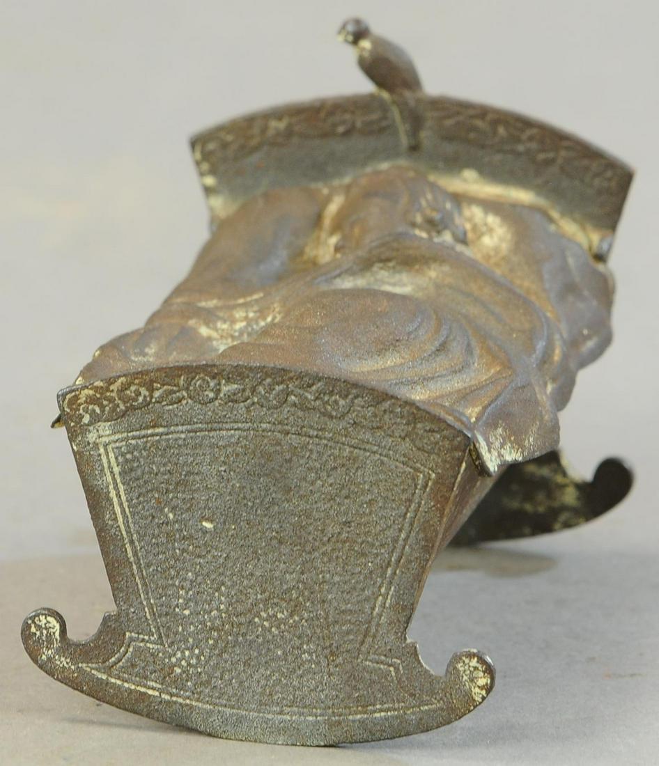 GREY IRON CRADLE STILL BANK (1 of 3)