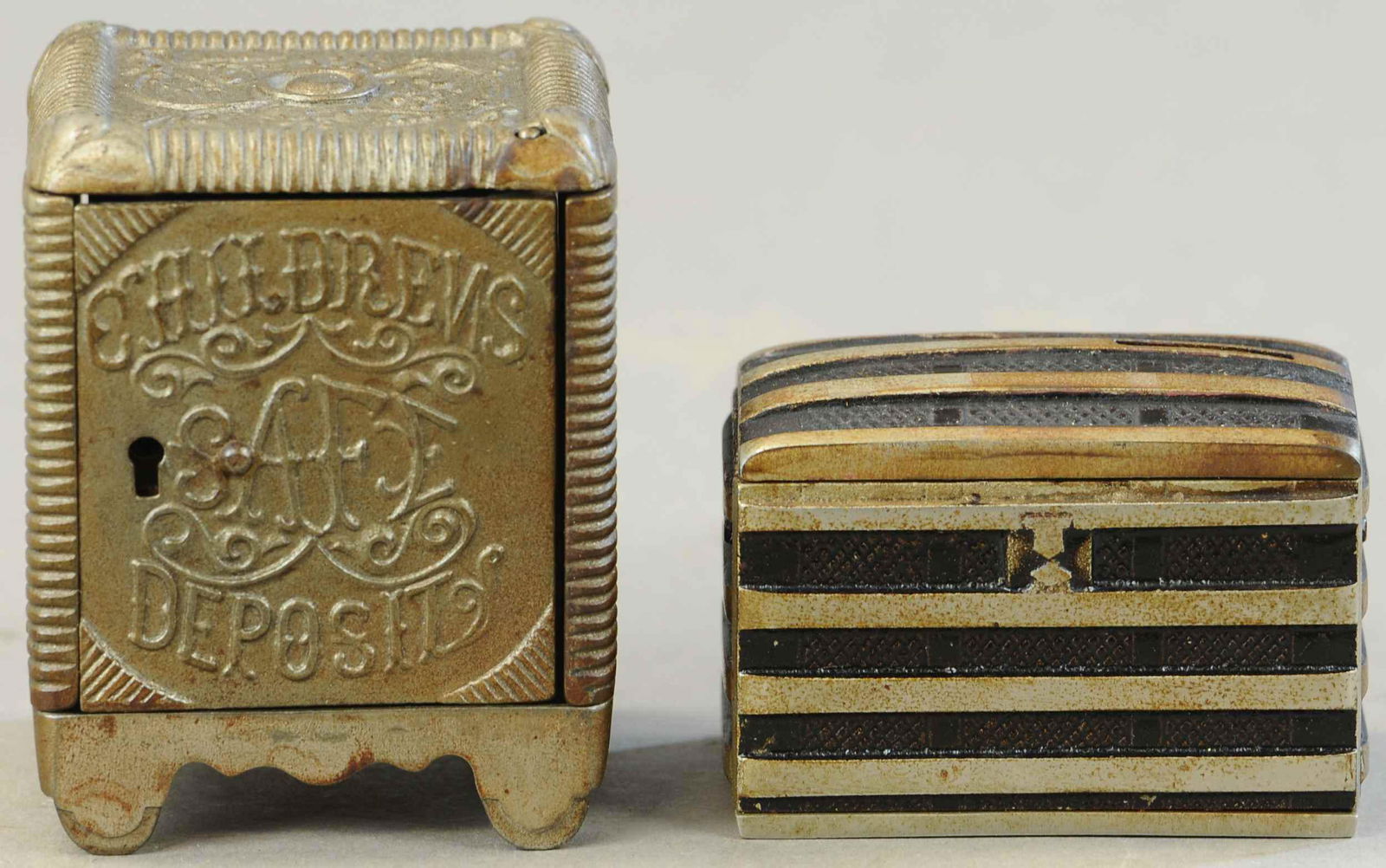 CHILDREN'S SAFE & TRUNK STILL BANKS (1 of 3)