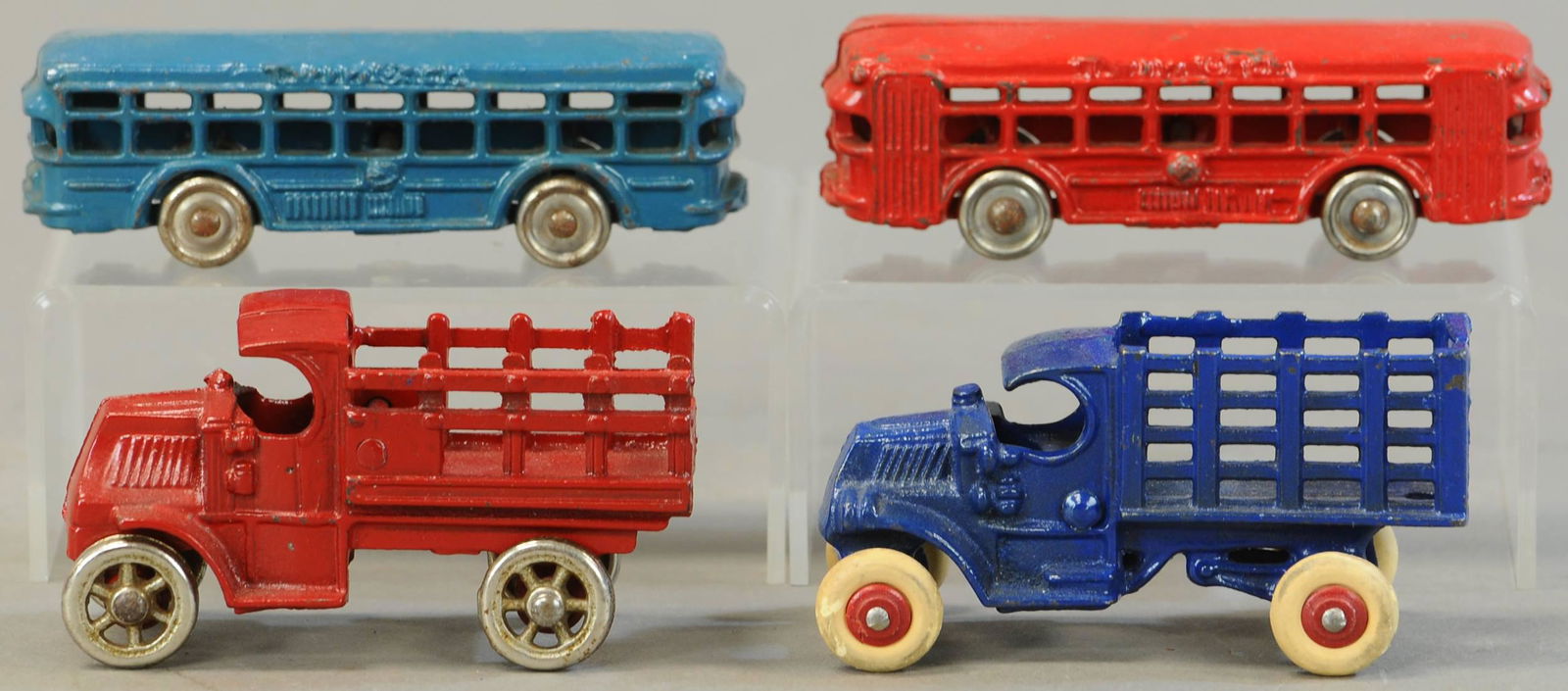 FOUR SMALL CAST IRON VEHICLES (1 of 4)
