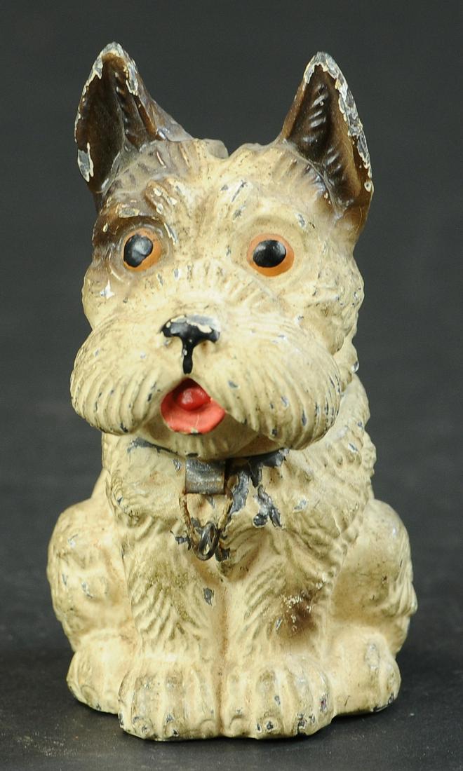 SCOTTISH TERRIER SPELTER STILL BANK: 663. SCOTTISH TERRIER SPELTER STILL BANK | Germany. Provenance: The Schroeder Collection. | 4" h. | Small flaw at rim of neck, overall (Excellent to Pristine Condition) | $700 - $1,000