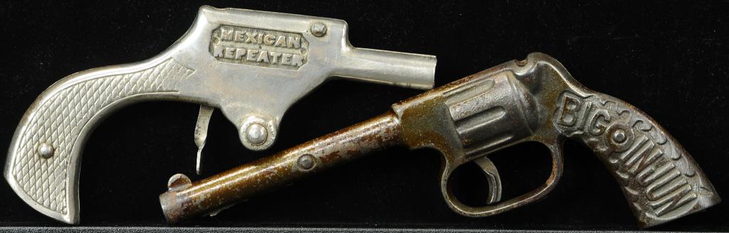 TWO CAST IRON CAP GUNS: 890. TWO CAST IRON CAP GUNS | Scarce Ives Big Injun & Mexican repeater. Provenance: The Schroeder Collection. | 6.75 - 8.25" l. | (Excellent Condition) | $400 - $600