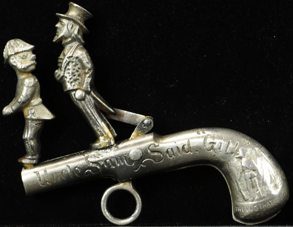 UNCLE SAM SAID GIT! ANIMATED CAP GUN: 928. UNCLE SAM SAID GIT! ANIMATED CAP GUN | Very rare gun, Dent Hardware, Uncle Sam kicks General Weyler on rear exploding the cap and knocking the General off the top of gun. Provenance: The Schroede