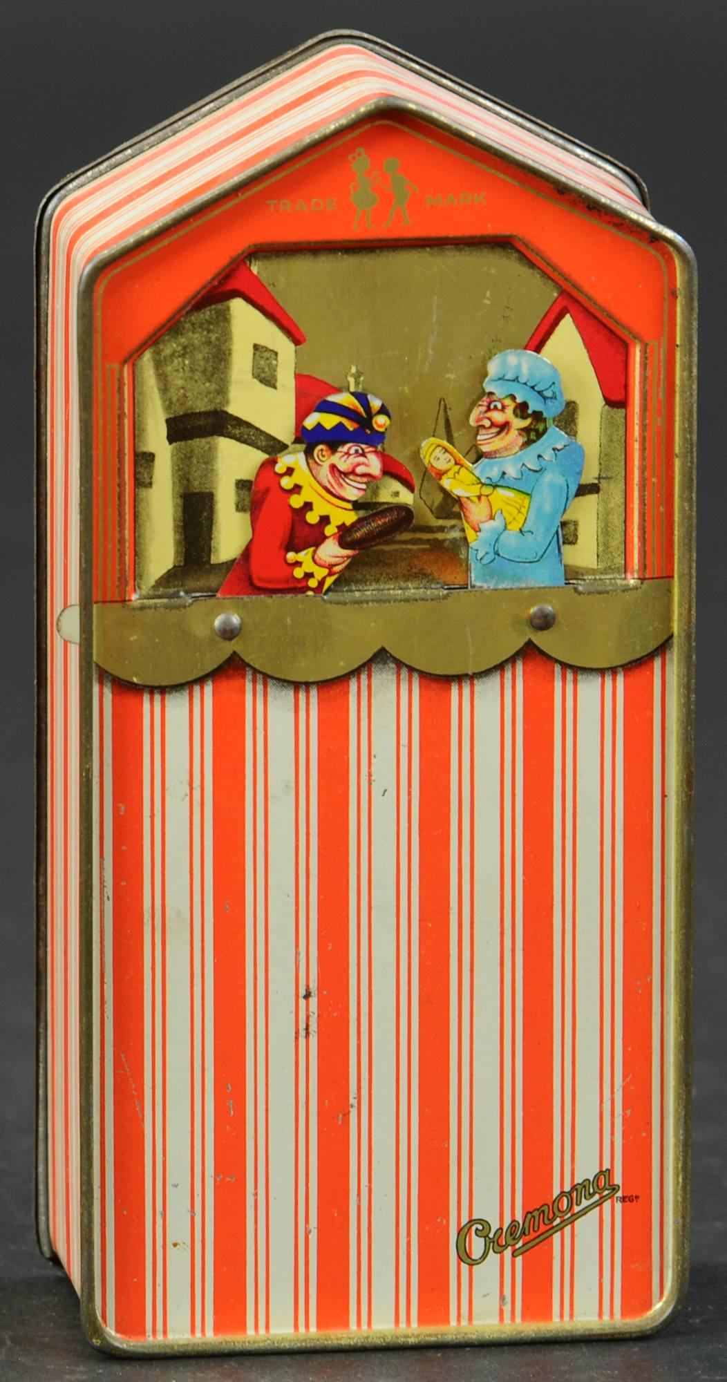 PUNCH AND JUDY BISCUIT TIN THEATRE: 1126. PUNCH AND JUDY BISCUIT TIN THEATRE | A.s. Wilkin Ltd., England, C. 1930, Lithographed Tinplate Provenance: The Schroeder Collection. | 8" h. | (Excellent to Pristine Condition) | $600 - $900