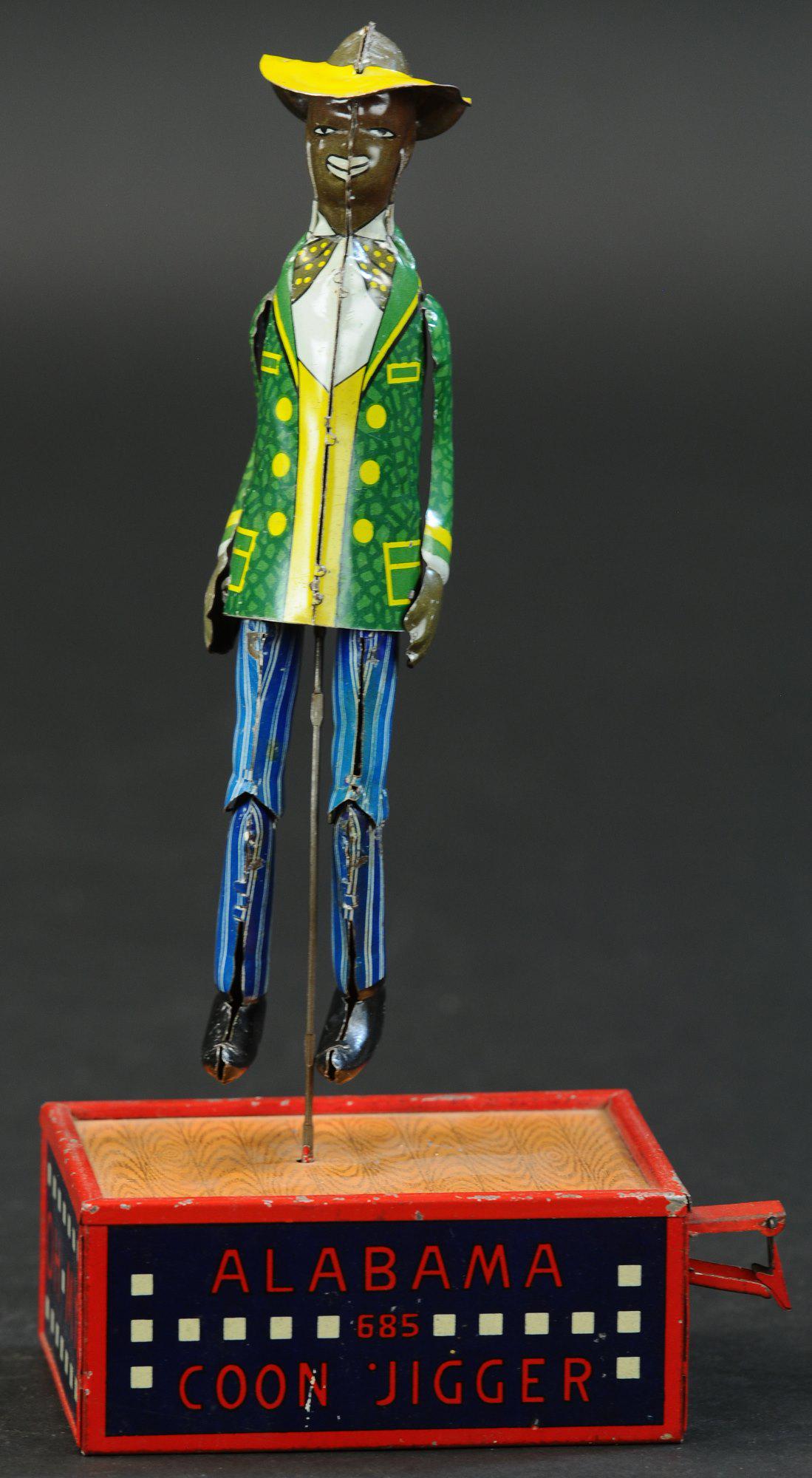 LEHMANN ALABAMA COON JIGGER: 1199. LEHMANN ALABAMA COON JIGGER | Provenance: The Schroeder Collection. | 14.5" h. | Figure is original but incorrect for this toy, tabs at one knee missing, otherwise in (Excellent Condition) | $25