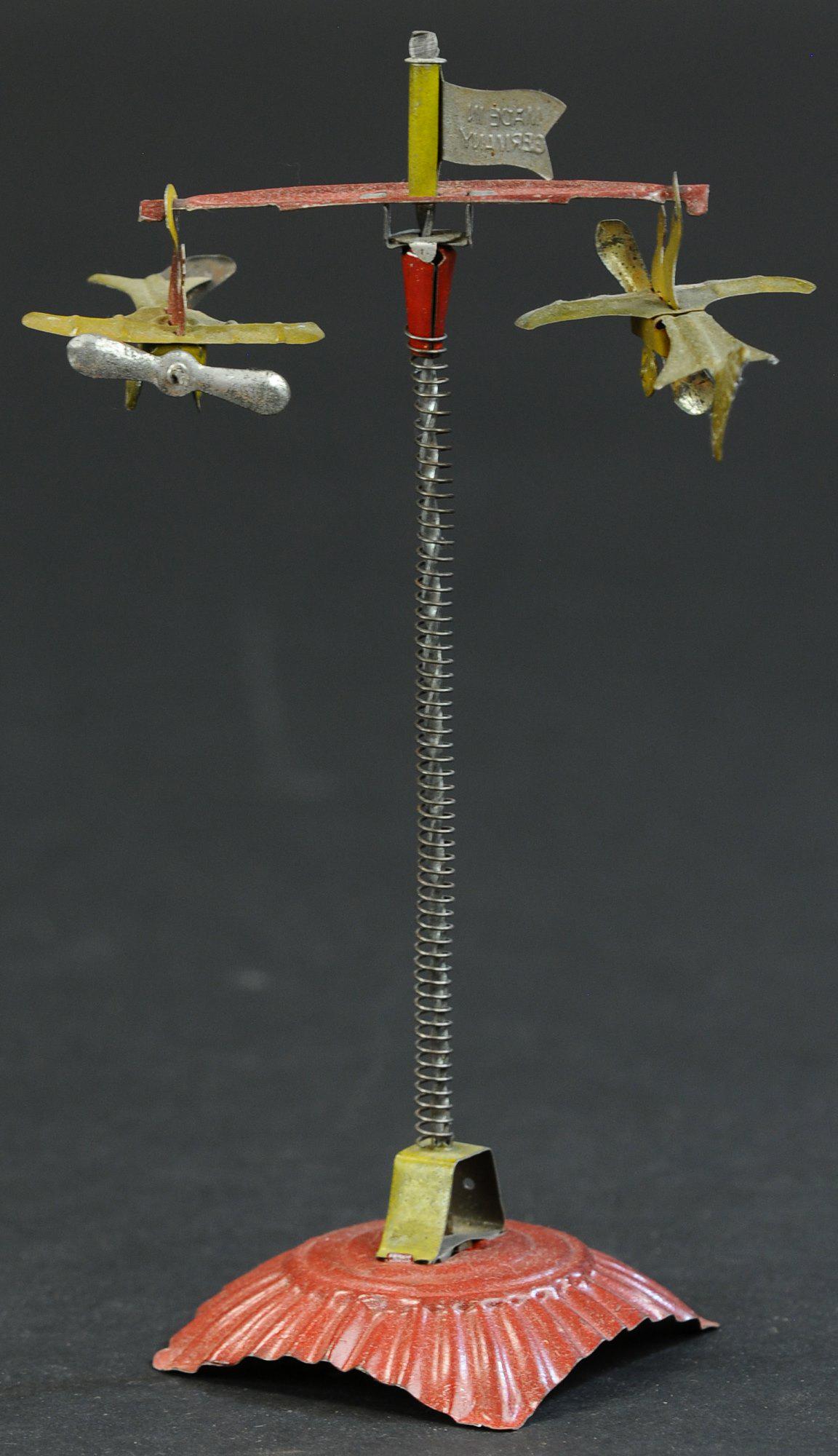 LARGE EINFALT SPIRAL PLANE PENNY TOY (1 of 3)