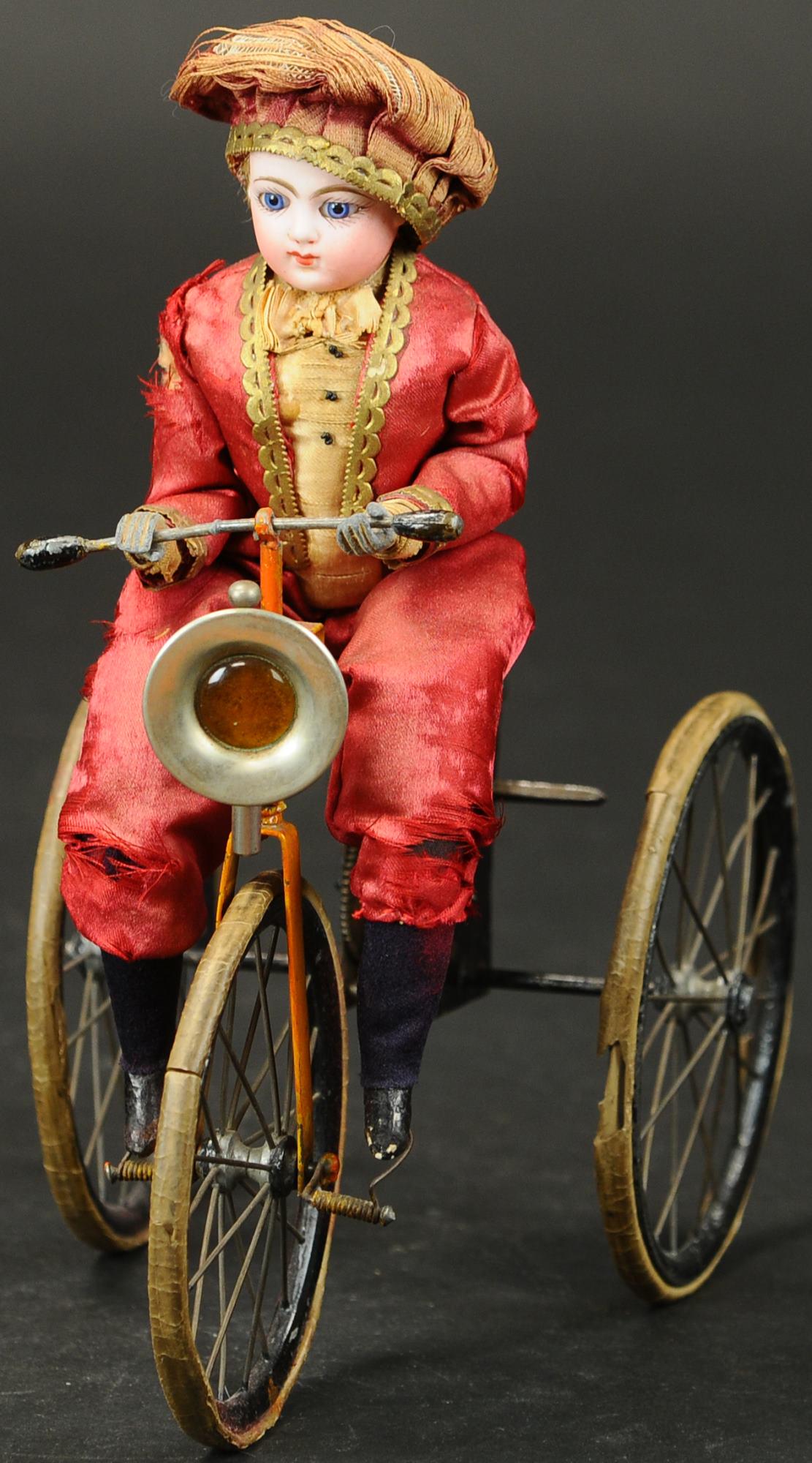 FRENCH CHILD ON MECHANICAL TRIKE (1 of 4)