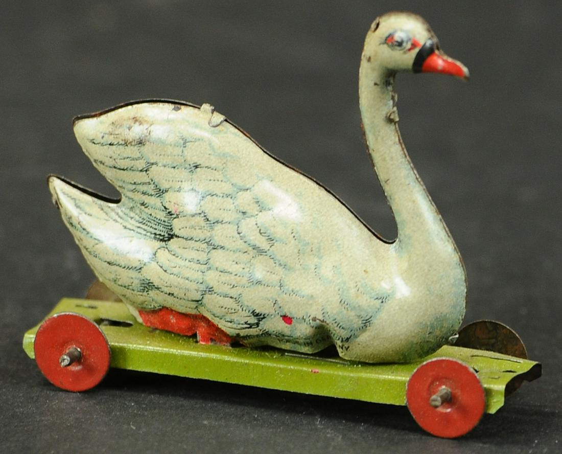 SWAN ON PLATFORM PENNY TOY (1 of 3)