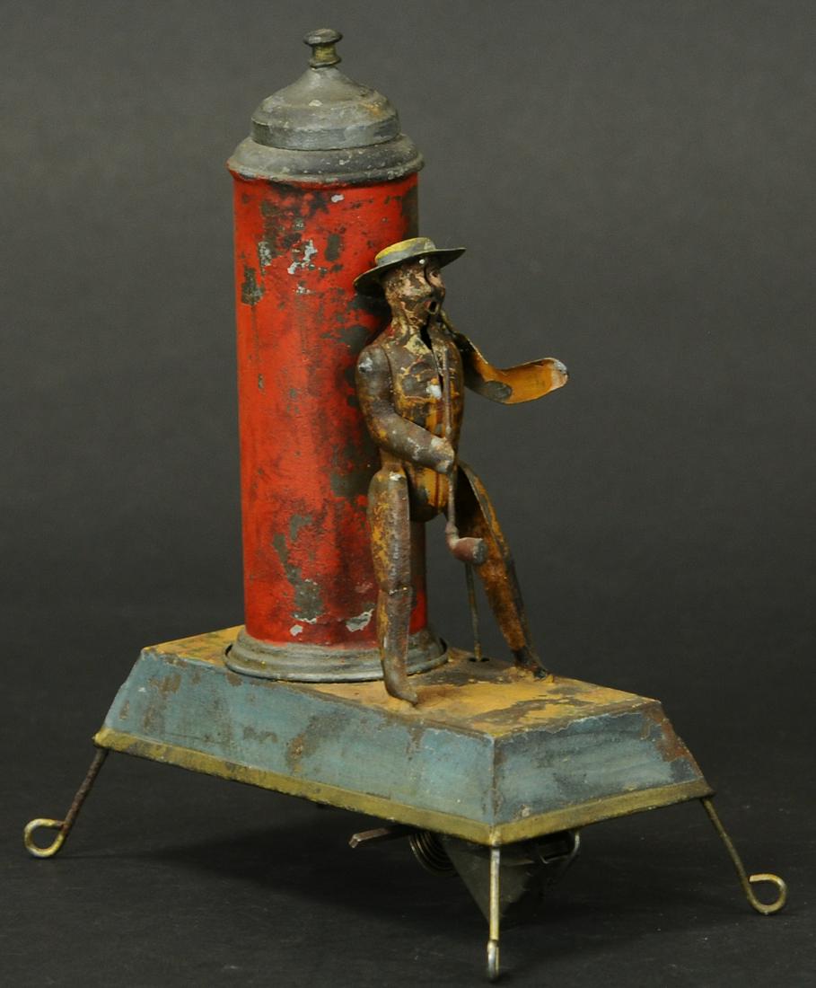 GUNTHERMANN GENTLEMAN SMOKER ON BASE: 183. GUNTHERMANN GENTLEMAN SMOKER ON BASE | Clockwork mechanism causes gentleman to raise arm and pipe to his mouth, while bellows beneath platform causes smoke to come out of mouth as if the gentlema