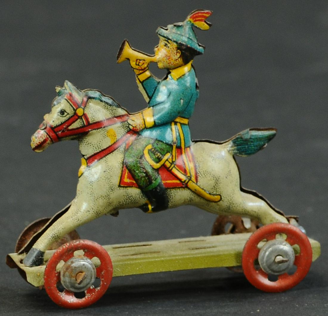 MEIER BUGLE BOY ON HORSE PENNY TOY (1 of 3)