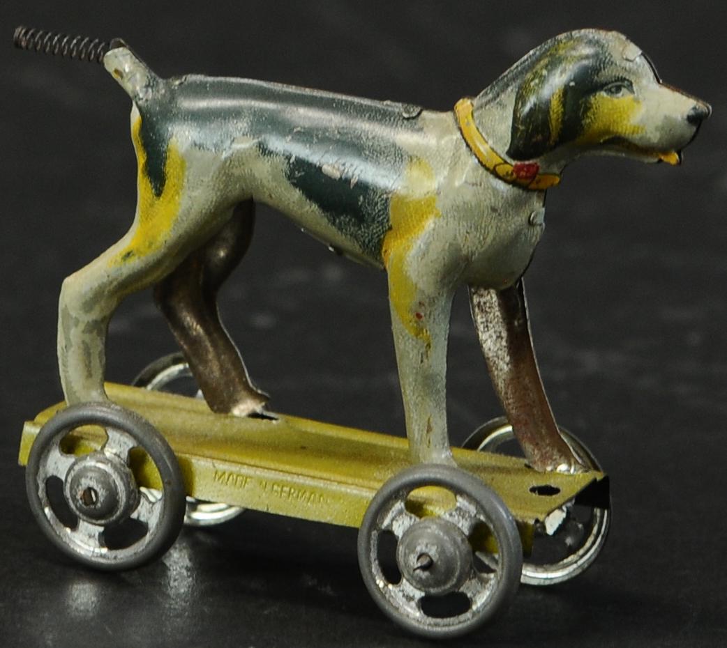 DISTLER DOG W/ SPRING TAIL PENNY TOY (1 of 3)