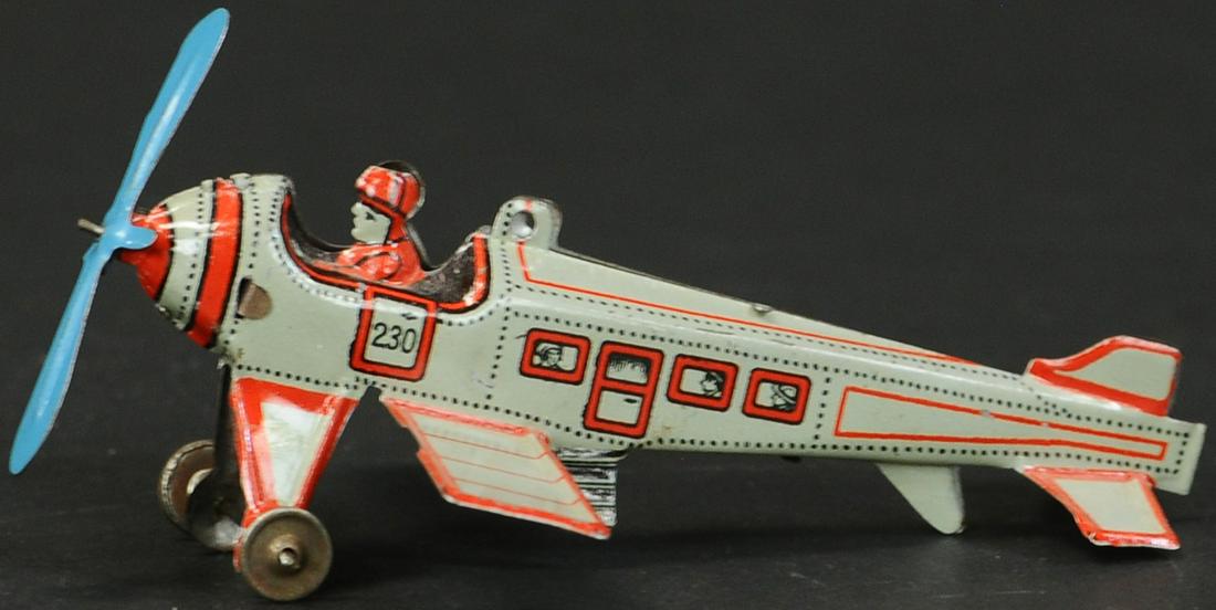 GREY KELLERMANN AIRPLANE PENNY TOY (1 of 3)