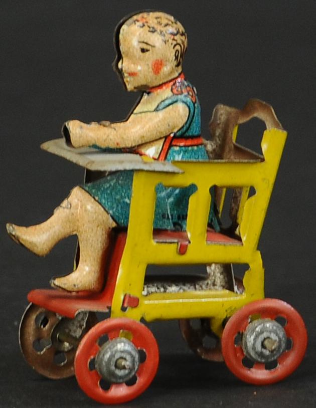 DISTLER CHILD IN CHAIR PENNY TOY (1 of 2)