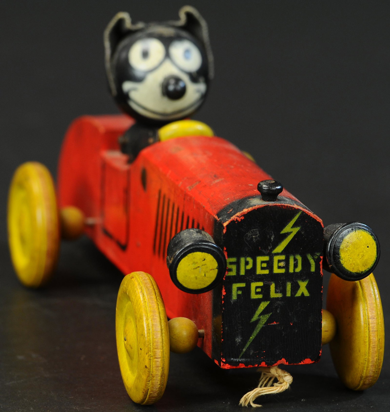 SPEEDY FELIX WOODEN RACE CAR: 524. SPEEDY FELIX WOODEN RACE CAR | Working. | 12" l. | (Exc. Cond.) | $300 - $500